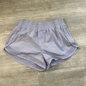 ASICS women’s purple running shorts size m